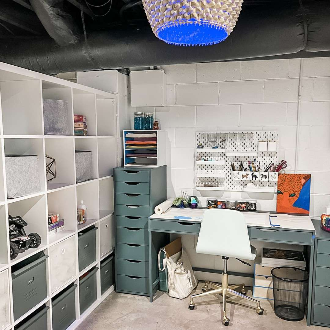 A workspace with drawer dividers and organized desk items