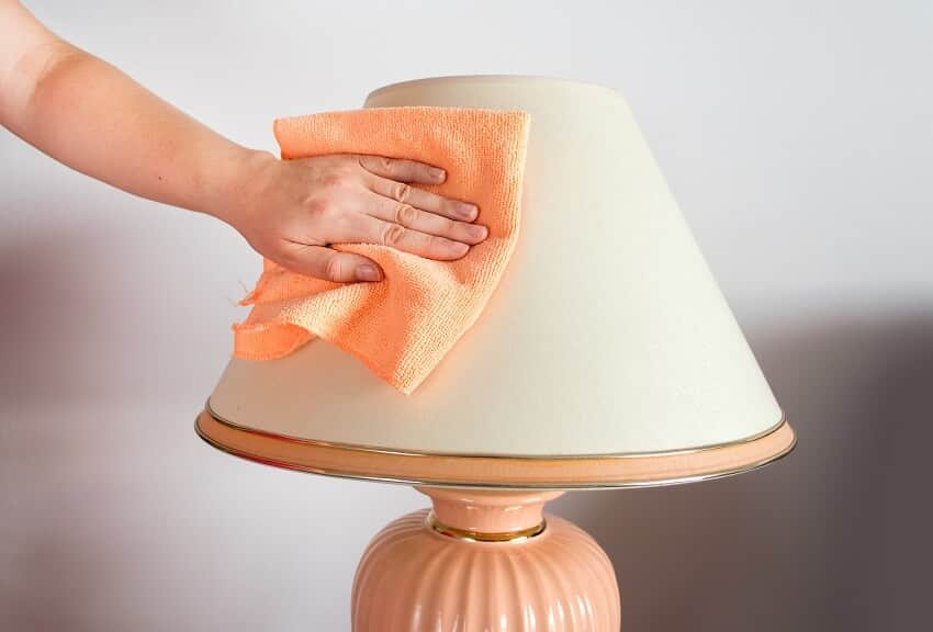 Clean most fabric shades with a vacuum cleaner